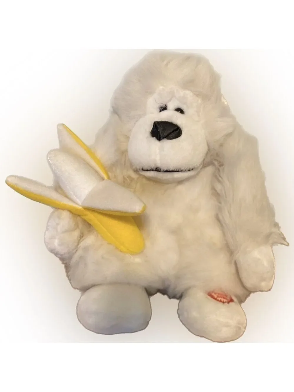 Animated stuffed Gorilla. Press button and he sings and moves Needs 2 AA Battery